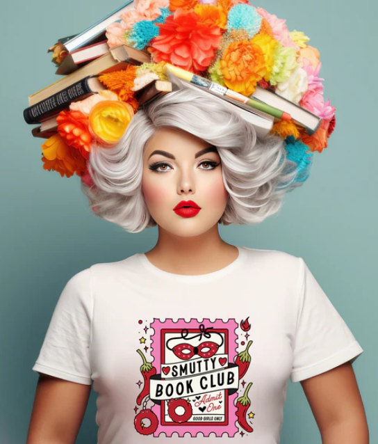 Woman wearing a white t-shirt with a colorful Smutty Book Club graphic design featuring masks and flames.